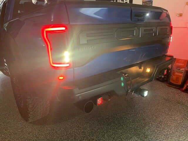 long view of the SPV Hitch mounted back up light plugged into a Ford Raptor