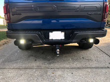 Blue Raptor with SPV Custom Raptor Backup light kit developed by specialty performance vehicles LLC
